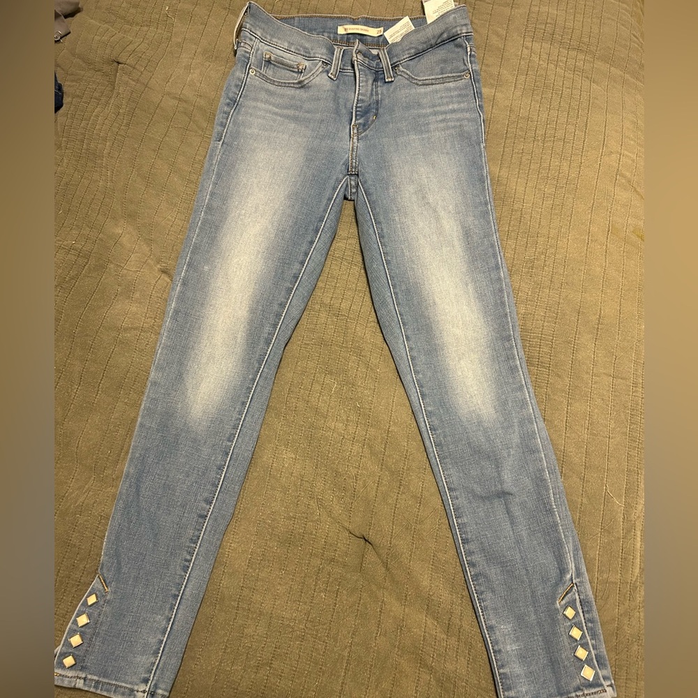 311 Levi’s denim with button snaps size 25